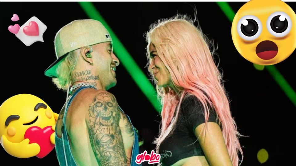 Los cantantes se dieron un románico beso frente a miles de espectadores.